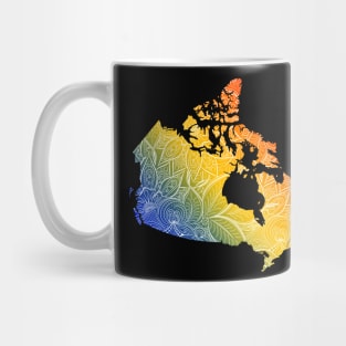 Colorful mandala art map of Canada with text in blue, yellow, and red Mug